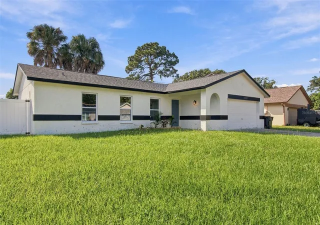 Photo 2 of Single family home for sale at 13918 Briardale Ln, Tampa, FL 33618 | MLS# TB8550941 | Listing updated on 2026-09-23