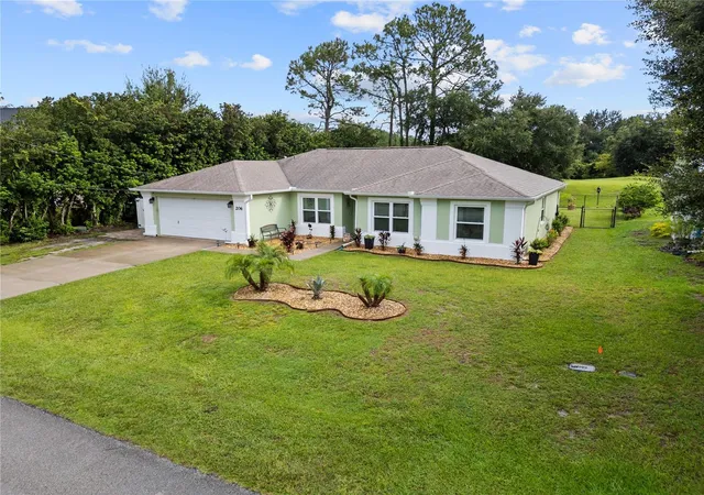 Photo 1 of Single family home for sale at 206 London Dr, Palm Coast, FL 32137 | MLS# FC321610 | Listing updated on 2026-10-05