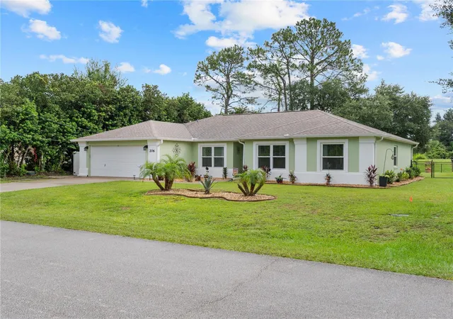 Photo 2 of Sale Pending at 206 London Dr, Palm Coast, FL 32137 | MLS# FC321610 | Listing updated on 2026-10-26