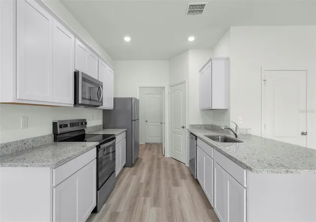 Photo 3 of Single family home for sale at 13238 Tula Loop, Astatula, FL 34705 | MLS# TB8550957 | Listing updated on 2026-10-07