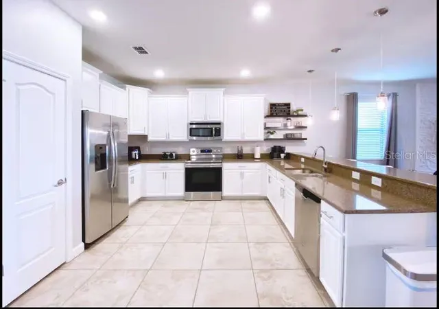Photo 3 of Single family home for sale at 1454 Rolling Fairway Dr, Davenport, FL 33896 | MLS# O6443746 | Listing updated on 2026-09-22