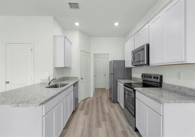 Photo 3 of Single family home for sale at 13245 Tula Loop, Astatula, FL 34705 | MLS# TB8550959 | Listing updated on 2026-09-22