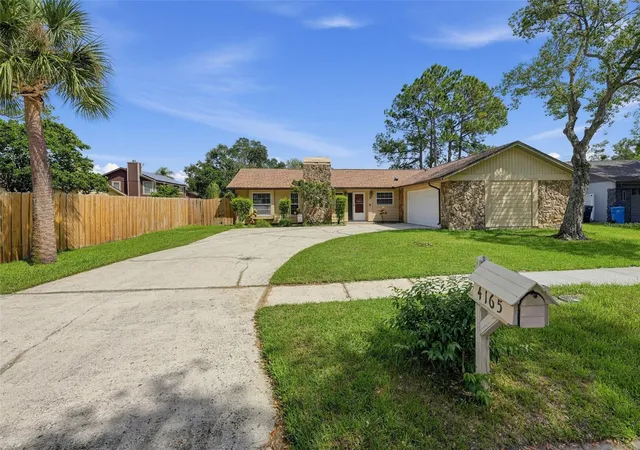 Photo 1 of Single family home for sale at 4165 Rolling Springs Dr, Tampa, FL 33624 | MLS# O6443748 | Listing updated on 2026-10-02