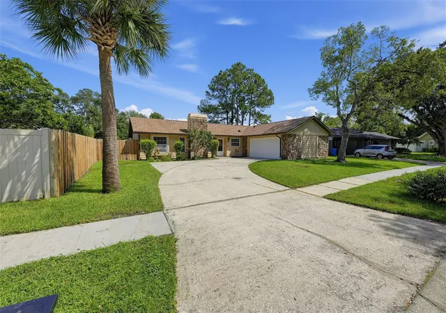 Photo 2 of Single family home for sale at 4165 Rolling Springs Dr, Tampa, FL 33624 | MLS# O6443748 | Listing updated on 2026-10-02