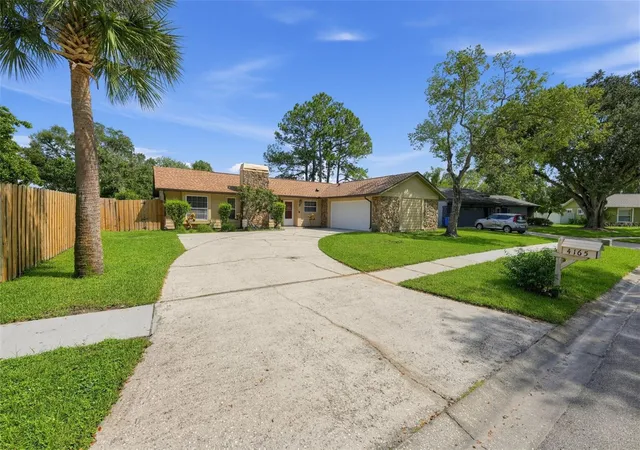 Photo 3 of Single family home for sale at 4165 Rolling Springs Dr, Tampa, FL 33624 | MLS# O6443748 | Listing updated on 2026-10-02