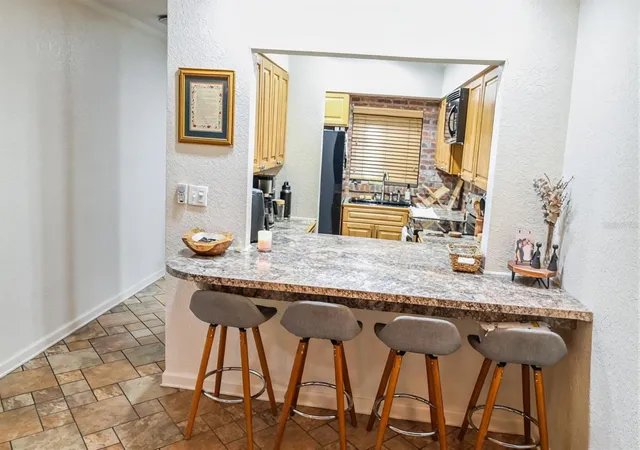 Photo 4 of Condo for sale at 1541 NE 34th Court #104, Oakland Park, FL 33334 | MLS# O6443749 | Listing updated on 2026-09-30