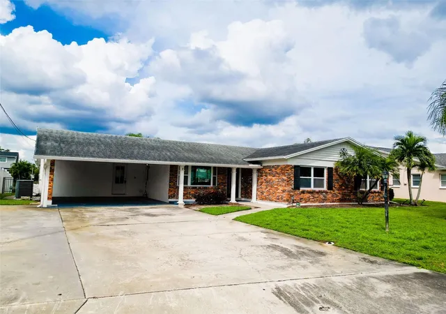 Photo 2 of Single family home for sale at 8723 Hickorywood Ln, Tampa, FL 33615 | MLS# TB8550971 | Listing updated on 2026-10-07
