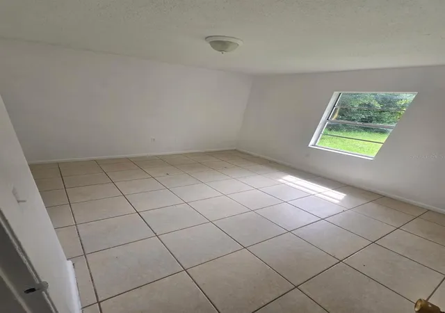 Photo 4 of Single family home for sale at 1684 Fort Smith Blvd, Deltona, FL 32725 | MLS# O6443779 | Listing updated on 2026-10-09