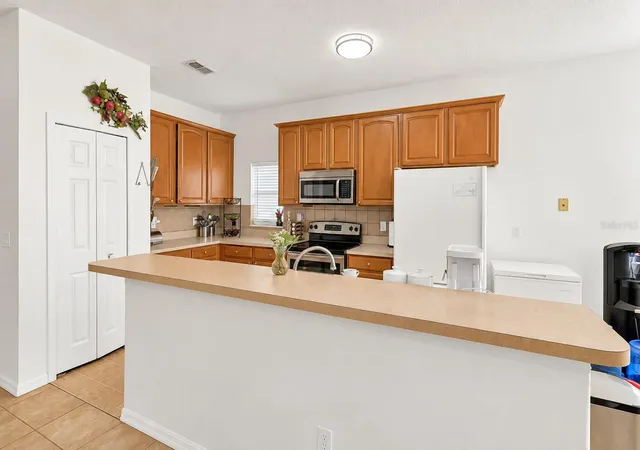 Photo 2 of Single family home for sale at 13738 Eden Isle Blvd, Windermere, FL 34786 | MLS# S5158063 | Listing updated on 2026-09-24