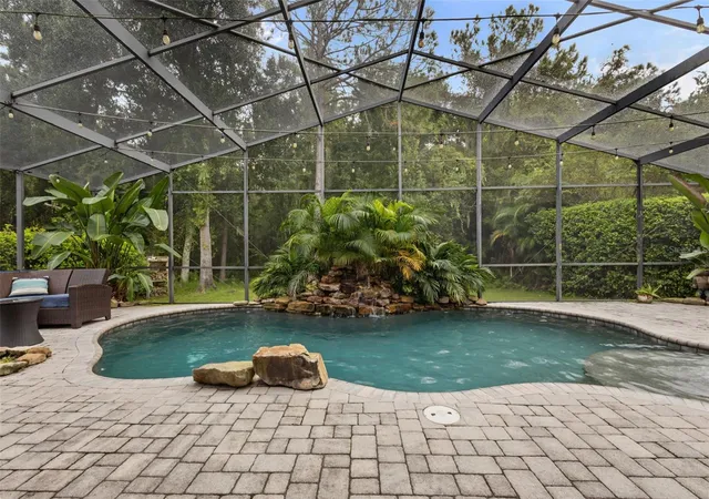 Photo 3 of Single family home for sale at 7729 Arelli Dr, Trinity, FL 34655 | MLS# TB8551017 | Listing updated on 2026-09-29