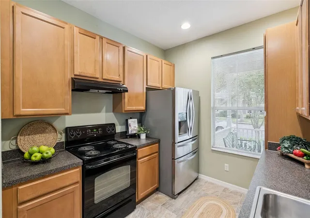 Photo 4 of Townhouse for sale at 14559 Clarkson Dr, Orlando, FL 32828 | MLS# O6443797 | Listing updated on 2026-09-25