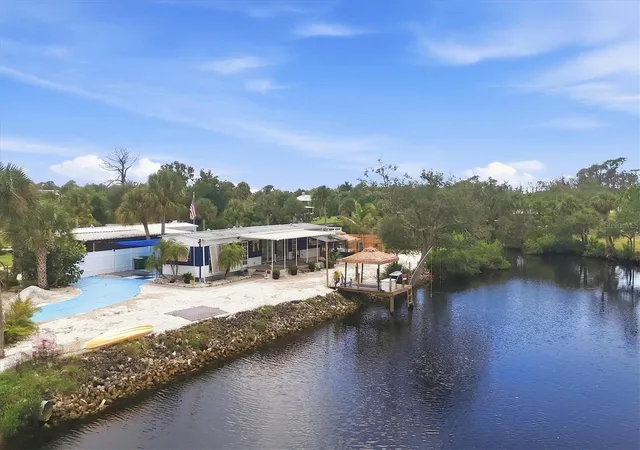 Photo 1 of Manufactured home for sale at 1128 Seahorse Ln, Englewood, FL 34224 | MLS# D6148874 | Listing updated on 2026-10-07