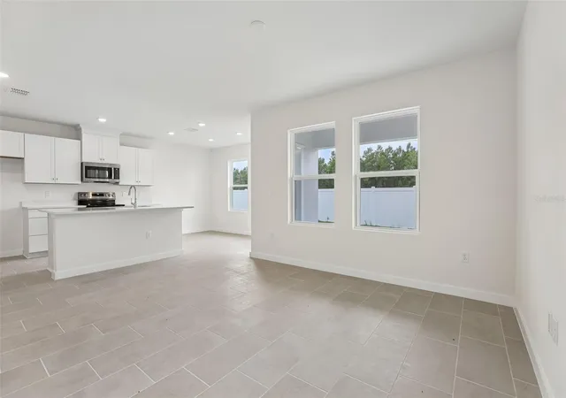 Photo 2 of Townhouse for sale at 6530 Horseshoe Ln Way, Harmony, FL 34773 | MLS# O6443818 | Listing updated on 2026-09-23