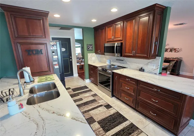 Photo 3 of Sale Pending at 1416 Pinewood Hills Ct, Spring Hill, FL 34606 | MLS# W7889717 | Listing updated on 2026-09-23