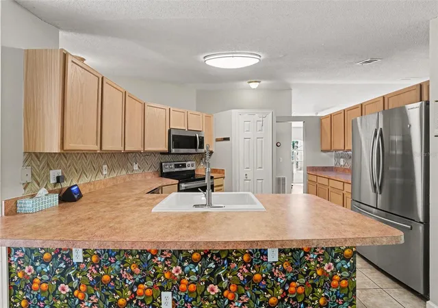 Photo 4 of Single family home for sale at 107 Mediterranean Ct, Kissimmee, FL 34758 | MLS# O6443851 | Listing updated on 2026-10-21