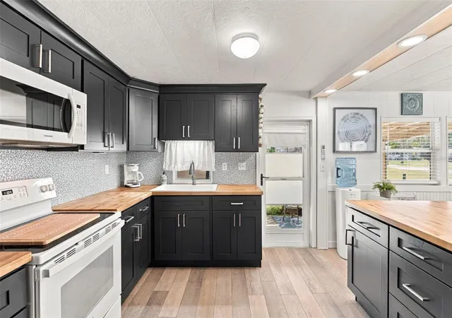 Photo 3 of Manufactured home for sale at 1954 Kentucky Ave, Englewood, FL 34224 | MLS# D6148876 | Listing updated on 2026-09-26