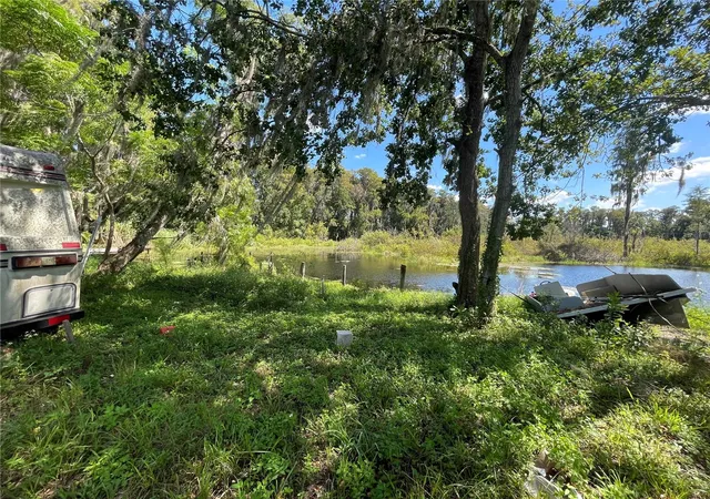 Photo 2 of Land for sale at Moon Lake Cir, New Port Richey, FL 34654 | MLS# W7889718 | Listing updated on 2026-09-23