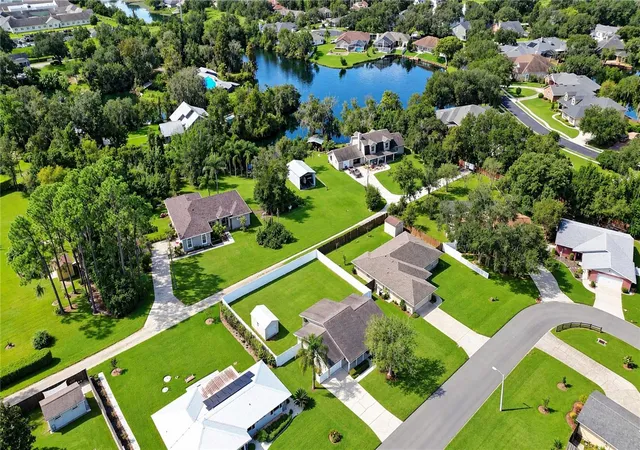 Photo 2 of Single family home for sale at 735 Scott Lake Village S, Lakeland, FL 33813 | MLS# TB8551117 | Listing updated on 2026-09-30