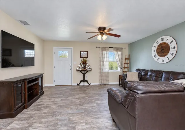 Photo 3 of Single family home for sale at 735 Scott Lake Village S, Lakeland, FL 33813 | MLS# TB8551117 | Listing updated on 2026-09-30