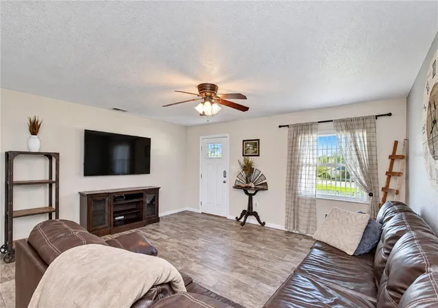 Photo 4 of Single family home for sale at 735 Scott Lake Village S, Lakeland, FL 33813 | MLS# TB8551117 | Listing updated on 2026-09-30