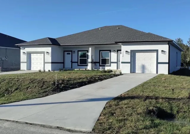 Photo 1 of Multi family home for sale at 12216 Tetzel Ave, Port Charlotte, FL 33981 | MLS# C7531055 | Listing updated on 2026-09-23