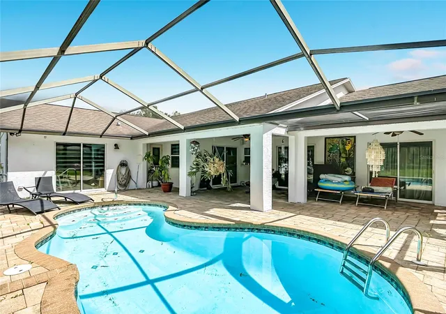 Photo 3 of Single family home for sale at 4119 Castle Ave, Spring Hill, FL 34609 | MLS# W7889723 | Listing updated on 2026-10-08