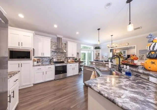 Photo 2 of Manufactured home for sale at 1225 Hazelnut St, Bunnell, FL 32110 | MLS# FC321627 | Listing updated on 2026-09-26