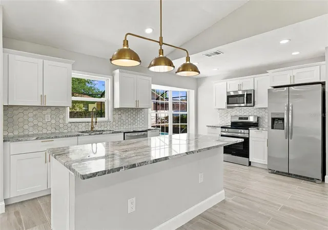 Photo 4 of Single family home for sale at 11365 Riddle Dr, Spring Hill, FL 34609 | MLS# W7889724 | Listing updated on 2026-10-20