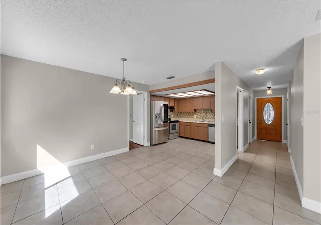 Photo 2 of Single family home for sale at 9602 Hidden Oaks Cir, Tampa, FL 33612 | MLS# TB8551167 | Listing updated on 2026-10-27