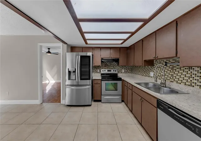 Photo 3 of Single family home for sale at 9602 Hidden Oaks Cir, Tampa, FL 33612 | MLS# TB8551167 | Listing updated on 2026-10-27