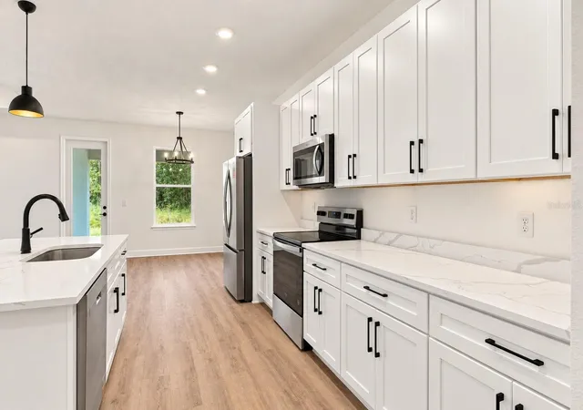 Photo 4 of Single family home for sale at 12469 Albany Rd, Weeki Wachee, FL 34614 | MLS# W7889730 | Listing updated on 2026-10-03