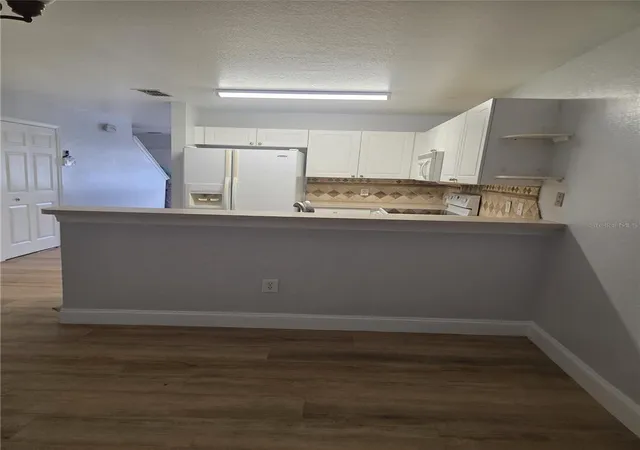 Photo 4 of Townhouse for sale at 302 Cervantes Dr, Kissimmee, FL 34743 | MLS# O6444024 | Listing updated on 2026-10-01