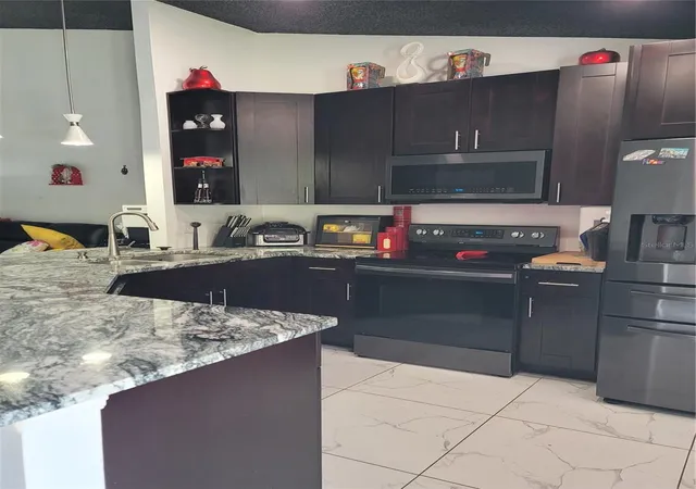 Photo 2 of House for sale at 1709 Rivers Edge Dr, Orlando, FL 32825 | MLS# O6444049 | Listing updated on 2026-09-23