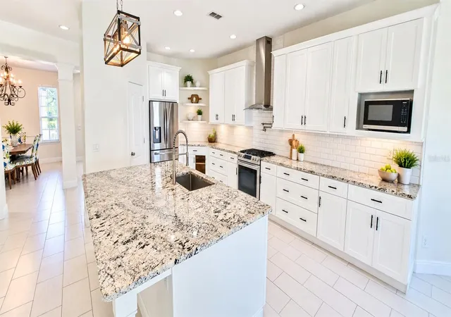 Photo 3 of Single family home for sale at 313 Merin Ct, Winter Garden, FL 34787 | MLS# O6444052 | Listing updated on 2026-10-21