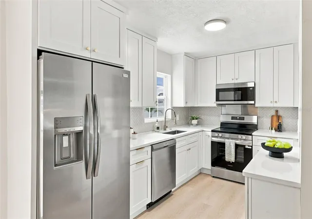 Photo 3 of Single family home for sale at 221 N Duncan Ave, Clearwater, FL 33755 | MLS# TB8551293 | Listing updated on 2026-09-24