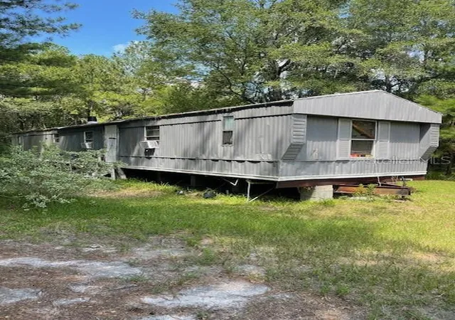 Photo 1 of Manufactured home for sale at 10918 Sw Archer Rd, Gainesville, FL 32608 | MLS# FC321643 | Listing updated on 2026-09-23