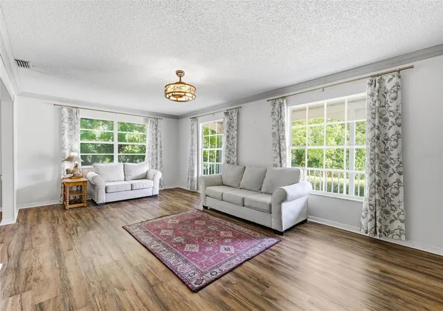 Photo 3 of Single family home for sale at 1304 Treetop Dr, Palm Harbor, FL 34683 | MLS# TB8551304 | Listing updated on 2026-10-08