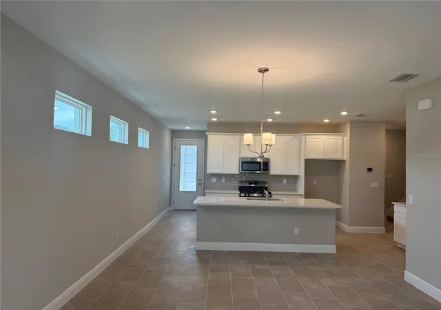 Photo 3 of Single family home for sale at 3704 Nandina Cir, Sun City Center, FL 33573 | MLS# TB8551321 | Listing updated on 2026-10-08