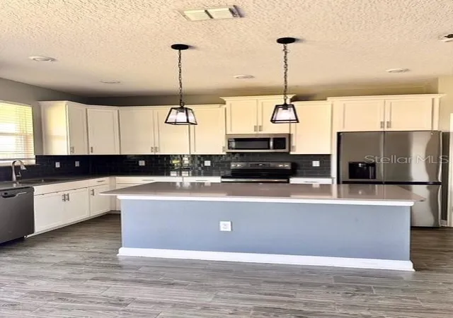 Photo 2 of Single family home for sale at 11815 Campfire Story Ln, Orlando, FL 32832 | MLS# O6444078 | Listing updated on 2026-09-23