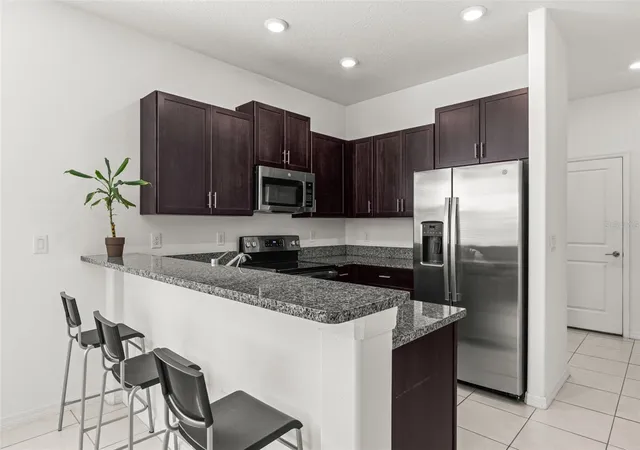 Photo 3 of Townhouse for sale at 14560 Easy Goer St, Ruskin, FL 33573 | MLS# TB8551326 | Listing updated on 2026-10-03
