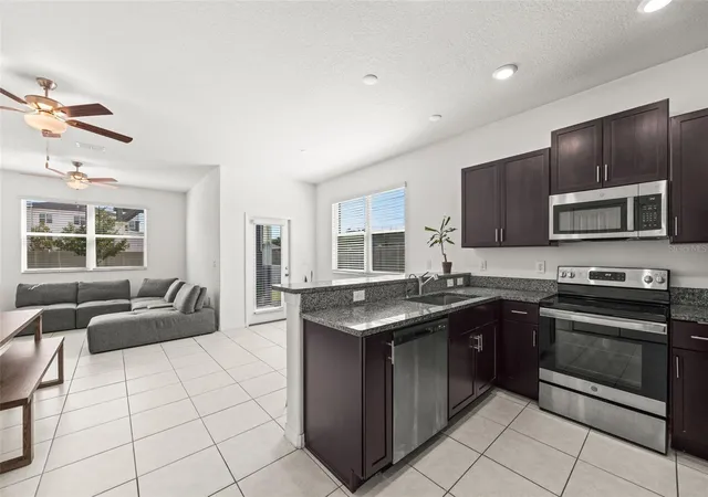 Photo 4 of Townhouse for sale at 14560 Easy Goer St, Ruskin, FL 33573 | MLS# TB8551326 | Listing updated on 2026-10-03