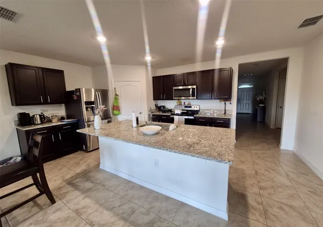 Photo 3 of Single family home for sale at 751 Grove St, Winter Haven, FL 33881 | MLS# TB8551355 | Listing updated on 2026-09-26