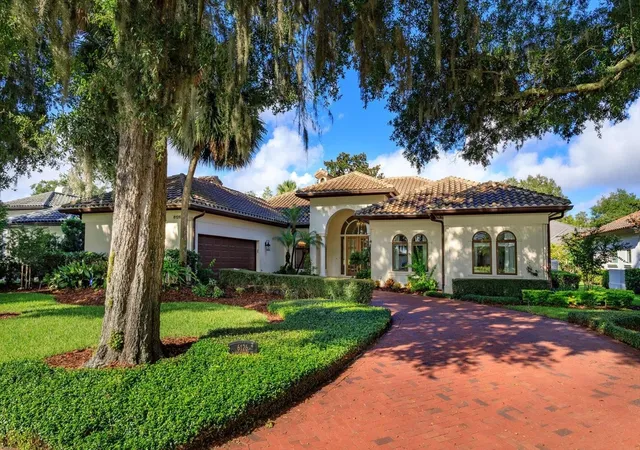 Photo 1 of Single family home for sale at 6126 Payne Stewart Dr, Windermere, FL 34786 | MLS# O6444116 | Listing updated on 2026-09-25