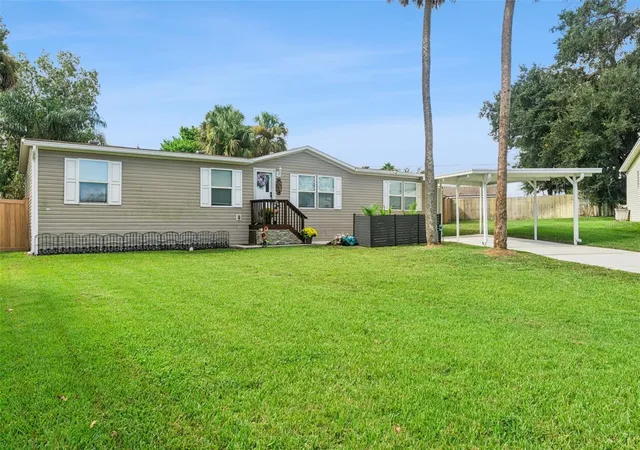 Photo 2 of Manufactured home for sale at 1137 Yaupon St, Daytona Beach, FL 32117 | MLS# O6444133 | Listing updated on 2026-10-08