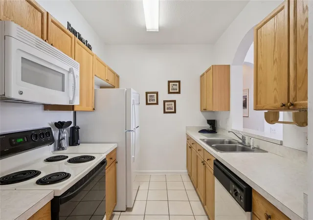 Listing Photo 1 - Condo for sale in building located at 2305 Butterfly Palm Wy, Kissimmee, FL 34747 - Unit #102