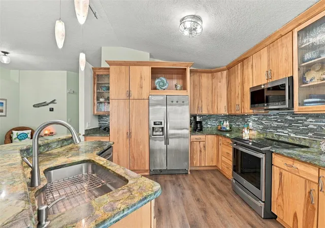 Photo 2 of Single family home for sale at 5604 Tughill Dr, Tampa, FL 33624 | MLS# TB8551402 | Listing updated on 2026-10-07
