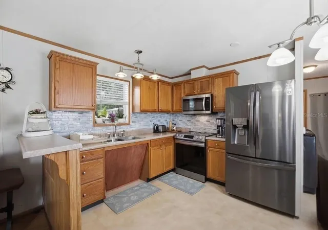 Photo 4 of Manufactured home for sale at 39318 Miramar Dr, Zephyrhills, FL 33540 | MLS# TB8551411 | Listing updated on 2026-10-01