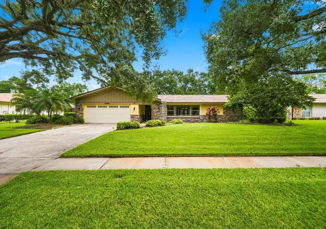 Photo 1 of Single family home for sale at 13903 Middle Park Dr, Tampa, FL 33624 | MLS# TB8551440 | Listing updated on 2026-09-25