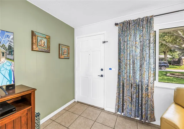 Photo 3 of Single family home for sale at 1350 Woodcrest Ave, Clearwater, FL 33756 | MLS# TB8551441 | Listing updated on 2026-10-06