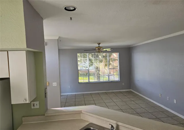 Listing Photo 1 - Condo for sale in building located at 9190 Lake Chase Island Wy, TAMPA, FL 33626
